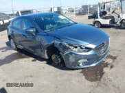 ✅ 2014 Mazda 3 i Grand Touring • VIN: JM1BM1M73E1200849 • Lot: 42789321. Listed on IAAI with 69,561 mi. Free auction sales archive from the USA and detailed vehicle history report at DreamBid. Image 1.