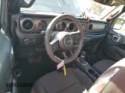 ✅ 2023 Jeep Wrangler Sport S • VIN: 1C4GJXAN1PW678441 • Lot: 70712135. Listed on Copart with 18,085 mi. Free auction sales archive from the USA and detailed vehicle history report at DreamBid. Image 8.