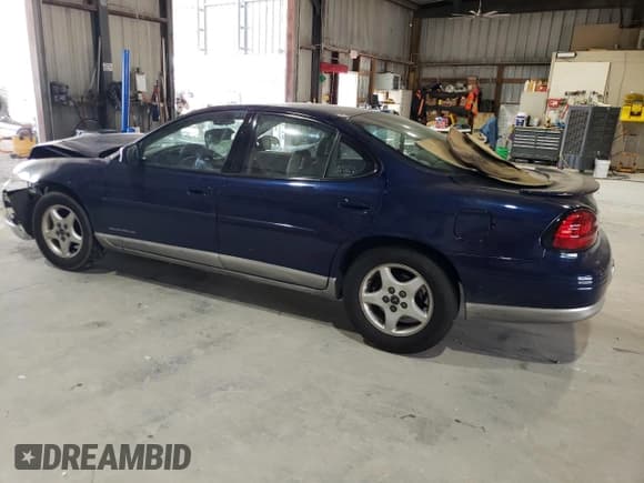 ✅ 2002 Pontiac Grand Prix SE • VIN: 1G2WK52J92F235590 • Lot: 61818015. Listed on Copart with 84,468 mi. Free auction sales archive from the USA and detailed vehicle history report at DreamBid. Image 2.