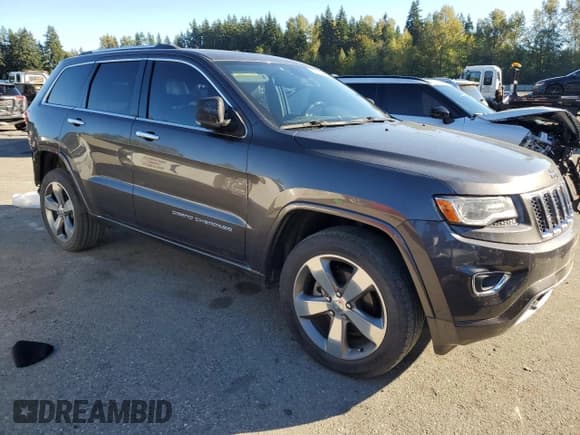 ✅ 2014 Jeep Grand Cherokee Overland • VIN: 1C4RJFCGXEC474530 • Lot: 86243445. Listed on Copart with 85,010 mi. Free auction sales archive from the USA and detailed vehicle history report at DreamBid. Image 4.