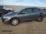 ✅ 2012 Honda Insight • VIN: JHMZE2H32CS000284 • Lot: 50160335. Listed on Copart with 64,074 mi. Free auction sales archive from the USA and detailed vehicle history report at DreamBid. Image 1.