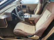 ✅ 1984 Pontiac Fiero • VIN: 1G2AF37R6EP320306 • Lot: 68255394. Wystawiony na Copart z przebiegiem 49 284 mil. Bezpłatny archiwum sprzedaży aukcyjnych z USA i szczegółowy raport historii pojazdu na DreamBid. Zdjęcie 7.