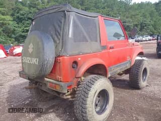 ✅ 1995 Suzuki Samurai • VIN: JS4JC31C0S4100145 • Lot: 42620704. Wystawiony na IAAI z przebiegiem 161 145 mil. Bezpłatny archiwum sprzedaży aukcyjnych z USA i szczegółowy raport historii pojazdu na DreamBid. Zdjęcie 4.