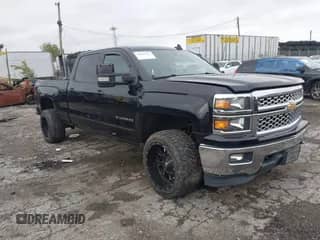 2015 Chevrolet Silverado 1500 LT z VIN 1GCUKREC6FF202219, wystawiony jako IAAI lot #42884932 z przebiegiem 92 938 mil mil oraz . Historia ofert i sprzedaży dostępna na DreamBid. Obrazek 1.