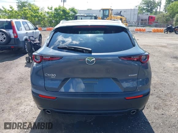 ✅ 2022 Mazda CX-30 S Carbon Edition • VIN: 3MVDMBCL9NM429826 • Lot: 42680808. Listed on IAAI with 28,234 mi. Free auction sales archive from the USA and detailed vehicle history report at DreamBid. Image 16.
