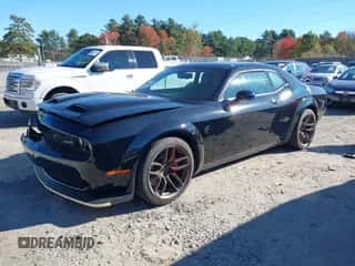 2022 Dodge Challenger SRT Hellcat z VIN 2C3CDZC9XNH104762, wystawiony jako IAAI lot #43392957 z przebiegiem 23 921 mil mil oraz . Historia ofert i sprzedaży dostępna na DreamBid. Obrazek 2.
