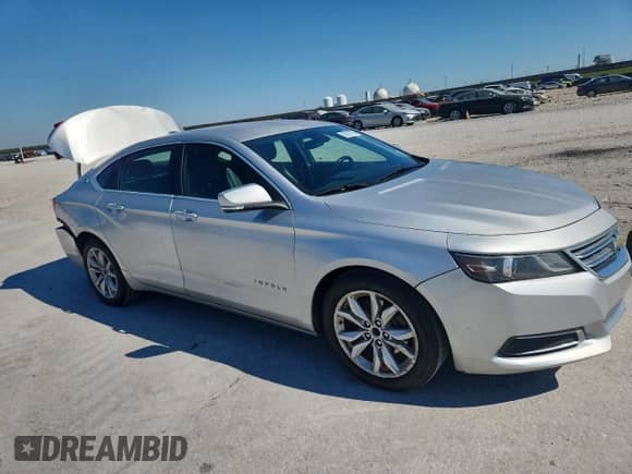 2017 Chevrolet Impala LT with VIN 1G1105SA4HU143554, listed as a Copart auction lot 86677125 with 198,009 mi miles and Salvage title. Bid and sale history available at DreamBid. Image 4.