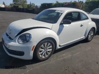 ✅ 2015 Volkswagen Beetle Fleet Edition • VIN: 3VWF17AT3FM620417 • Lot: 60671335. Listed on Copart with 80,880 mi. Free auction sales archive from the USA and detailed vehicle history report at DreamBid. Image 1.