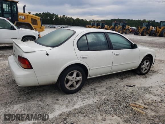 ✅ 1999 Nissan Maxima GXE • VIN: JN1CA21D2XT209629 • Lot: 73534574. Wystawiony na Copart z przebiegiem 325 314 mil. Bezpłatny archiwum sprzedaży aukcyjnych z USA i szczegółowy raport historii pojazdu na DreamBid. Zdjęcie 3.