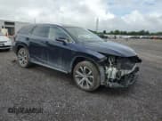 ✅ 2018 Lexus RX 450hL Premium • VIN: JTJDGKCAXJ2004699 • Lot: 63673635. Listed on Copart with 6,850 mi. Free auction sales archive from the USA and detailed vehicle history report at DreamBid. Image 4.