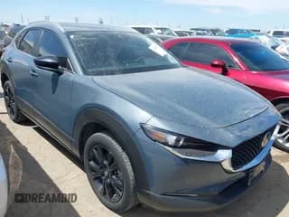 ✅ 2023 Mazda CX-30 S Carbon Edition • VIN: 3MVDMBCM8PM563187 • Lot: 42804652. Listed on IAAI with 13,384 mi. Free auction sales archive from the USA and detailed vehicle history report at DreamBid. Image 1.