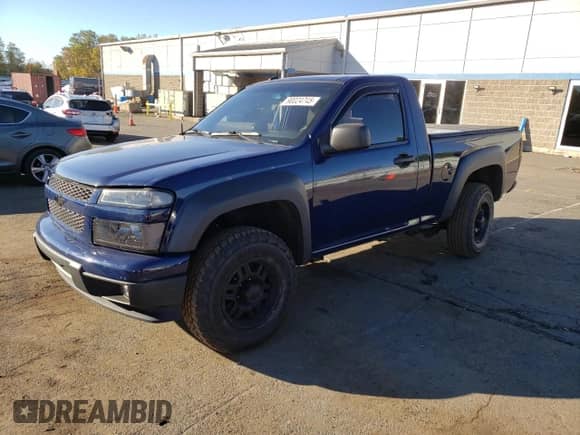 2012 Chevrolet Colorado Work Truck with VIN 1GCGTBFE3C8125018, listed as a Copart auction lot 90024745 with 156,864 mi miles and Salvage title. Bid and sale history available at DreamBid. Image 1.