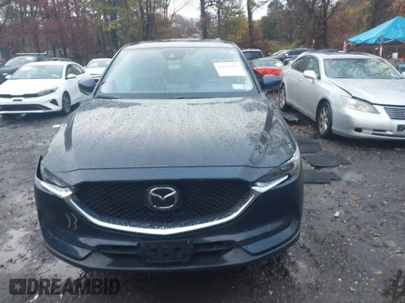 ✅ 2018 Mazda CX-5 Grand Touring • VIN: JM3KFBDM0J0362032 • Lot: 43643785. Wystawiony na IAAI z przebiegiem 57 581 mil. Bezpłatny archiwum sprzedaży aukcyjnych z USA i szczegółowy raport historii pojazdu na DreamBid. Zdjęcie 12.