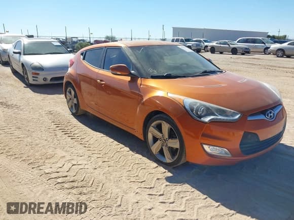 ✅ 2015 Hyundai Veloster • VIN: KMHTC6ADXFU219196 • Lot: 43606291. Listed on IAAI with 130,868 mi. Free auction sales archive from the USA and detailed vehicle history report at DreamBid. Image 1.