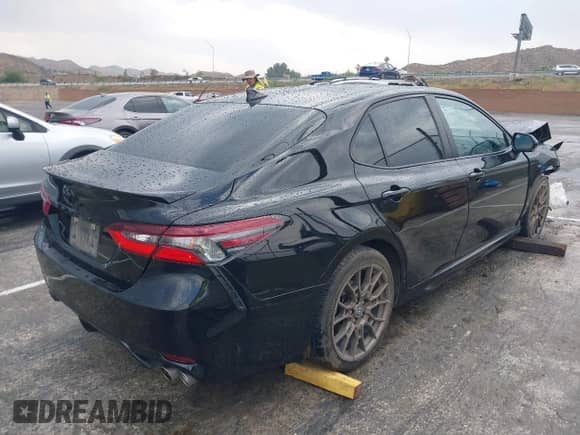 2023 Toyota Camry SE with VIN 4T1T11BK4PU080562, listed as a IAAI auction lot 42394695 with 37,299 mi miles and . Bid and sale history available at DreamBid. Image 4.