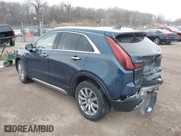 ✅ 2021 Cadillac XT4 FWD Premium Luxury • VIN: 1GYFZCR41MF041306 • Лот: 41143747. Опубликован ранее на IAAI с пробегом 53 116 миль. Бесплатный доступ к архиву аукционных продаж из США и подробный отчёт об истории автомобиля на DreamBid. Изображение 3.
