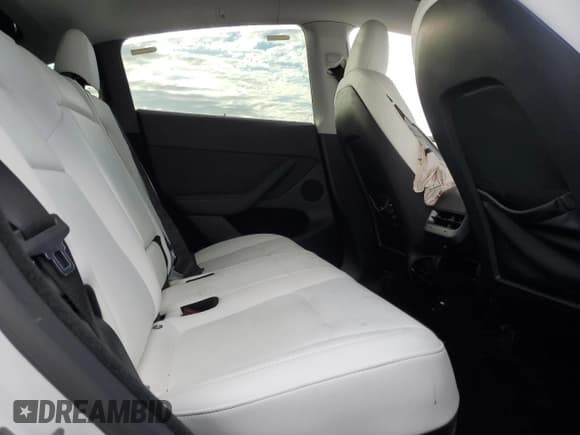 ✅ 2023 Tesla Model Y Long Range • VIN: 7SAYGDEE9PA098533 • Лот: 82690655. Опубликован ранее на Copart с пробегом 59 560 миль. Бесплатный доступ к архиву аукционных продаж из США и подробный отчёт об истории автомобиля на DreamBid. Изображение 11.