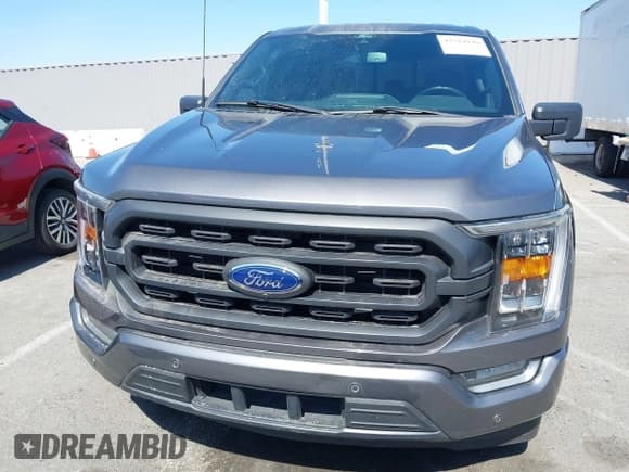✅ 2022 Ford F-150 • VIN: 1FTFW1C87NFA29516 • Lot: 42514149. Listed on IAAI with 47,407 mi. Free auction sales archive from the USA and detailed vehicle history report at DreamBid. Image 12.