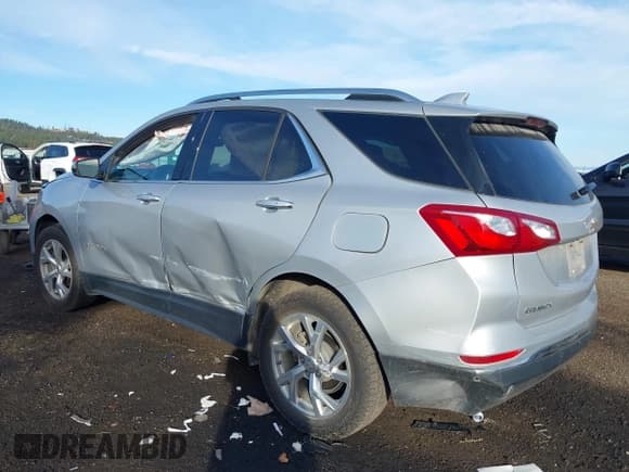 ✅ 2018 Chevrolet Equinox Premier • VIN: 2GNAXVEV1J6196158 • Лот: 43483047. Опубликован ранее на IAAI с пробегом 86 007 миль. Бесплатный доступ к архиву аукционных продаж из США и подробный отчёт об истории автомобиля на DreamBid. Изображение 3.
