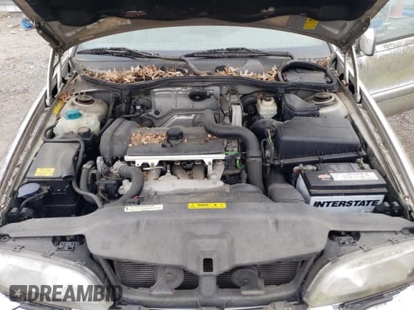 ✅ 2001 Volvo C70 • VIN: YV1NC56DX1J022713 • Лот: 49164995. Опубликован ранее на Copart с пробегом 93 461 миль. Бесплатный доступ к архиву аукционных продаж из США и подробный отчёт об истории автомобиля на DreamBid. Изображение 11.