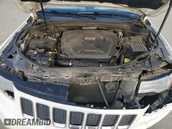 ✅ 2016 Jeep Grand Cherokee Overland • VIN: 1C4RJFCM9GC332730 • Lot: 86407904. Listed on Copart with 158,693 mi. Free auction sales archive from the USA and detailed vehicle history report at DreamBid. Image 12.