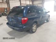 ✅ 2003 Dodge Caravan EX • VIN: 2D4GP74L13R262825 • Lot: 42424691. Listed on IAAI with 264,489 mi. Free auction sales archive from the USA and detailed vehicle history report at DreamBid. Image 4.