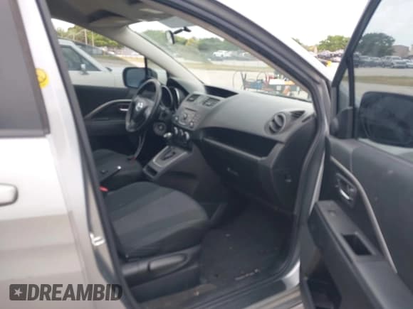 ✅ 2013 Mazda 5 Touring • VIN: JM1CW2CL5D0160104 • Lot: 41722470. Listed on IAAI with 135,708 mi. Free auction sales archive from the USA and detailed vehicle history report at DreamBid. Image 5.