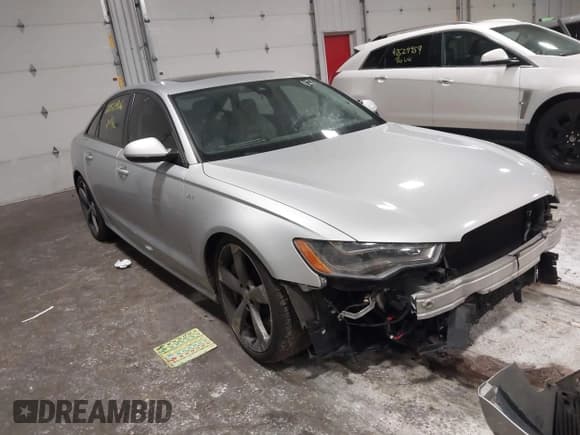 ✅ 2015 Audi S6 • VIN: WAUF2AFC9FN014211 • Lot: 42511906. Listed on IAAI with 105,845 mi. Free auction sales archive from the USA and detailed vehicle history report at DreamBid. Image 1.