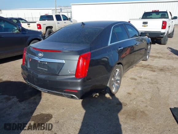 ✅ 2014 Cadillac CTS Vsport RWD • VIN: 1G6AU5S80E0188974 • Лот: 41915190. Опубликован ранее на IAAI с пробегом 103 623 миль. Бесплатный доступ к архиву аукционных продаж из США и подробный отчёт об истории автомобиля на DreamBid. Изображение 4.