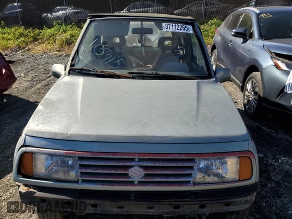 ✅ 1989 Suzuki Sidekick • VIN: JS4TA01C2K4102377 • Lot: 87112265. Wystawiony na Copart z przebiegiem 2 434 mil. Bezpłatny archiwum sprzedaży aukcyjnych z USA i szczegółowy raport historii pojazdu na DreamBid. Zdjęcie 11.