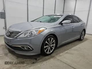 ✅ 2015 Hyundai Azera • VIN: KMHFG4JGXFA467689 • Лот: 80814505. Опубликован ранее на Copart с пробегом 141 461 миль. Бесплатный доступ к архиву аукционных продаж из США и подробный отчёт об истории автомобиля на DreamBid. Изображение 1.