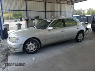 ✅ 2000 Lexus LS 400 • VIN: JT8BH28F0Y0178524 • Lot: 71263195. Listed on Copart with 102,429 mi. Free auction sales archive from the USA and detailed vehicle history report at DreamBid. Image 1.