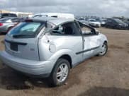 ✅ 2000 Ford Focus ZX3 • VIN: 3FAFP3139YR210307 • Lot: 41946264. Wystawiony na IAAI z przebiegiem 215 233 mil. Bezpłatny archiwum sprzedaży aukcyjnych z USA i szczegółowy raport historii pojazdu na DreamBid. Zdjęcie 4.