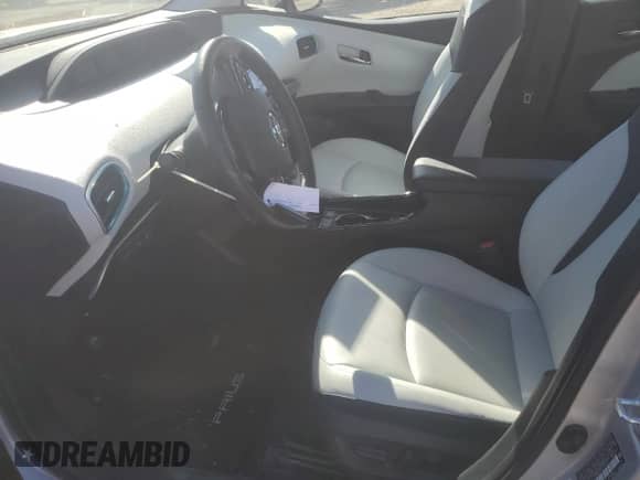 2021 Toyota Prius L Eco with VIN JTDKAMFU7M3137514, listed as a Copart auction lot 85843795 with 31,718 mi miles and Salvage title. Bid and sale history available at DreamBid. Image 7.