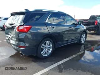 ✅ 2020 Chevrolet Equinox Premier • VIN: 2GNAXPEX6L6274952 • Лот: 43437304. Опубликован ранее на IAAI с пробегом 99 685 миль. Бесплатный доступ к архиву аукционных продаж из США и подробный отчёт об истории автомобиля на DreamBid. Изображение 4.