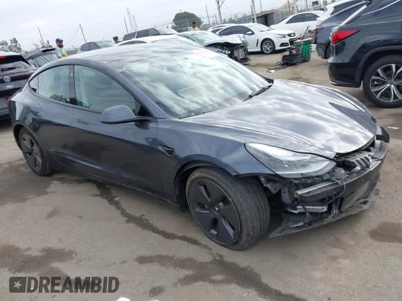 ✅ 2023 Tesla Model 3 • VIN: 5YJ3E1EA0PF644809 • Lot: 43271664. Listed on IAAI with 71,806 mi. Free auction sales archive from the USA and detailed vehicle history report at DreamBid. Image 1.