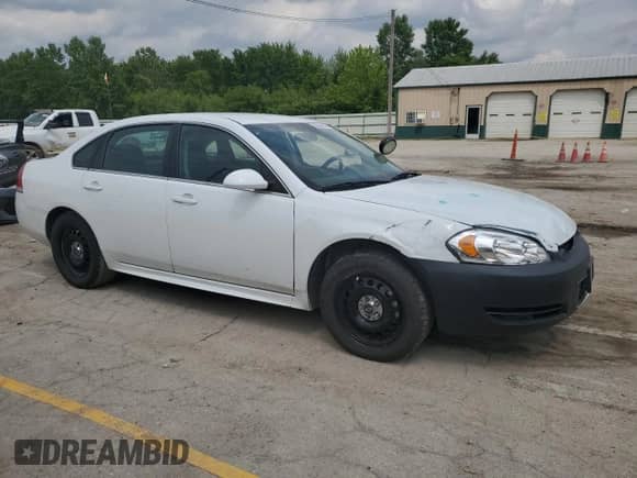 2014 Chevrolet Impala Police Police with VIN 2G1WD5E34E1126347, listed as a Copart auction lot 58949635 with 239,628 mi miles and Salvage title. Bid and sale history available at DreamBid. Image 4.