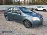 2011 Chevrolet Aveo 1LT z VIN KL1TD5DE4BB144492, wystawiony jako Copart lot #86099294 z przebiegiem 98 068 mil mil oraz Czysty tytuł • Clean title. Historia ofert i sprzedaży dostępna na DreamBid. Obrazek 4.