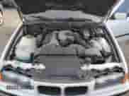 1996 BMW 3 Series z VIN 4USCD7322TLC50315, wystawiony jako Copart lot #87952885 z przebiegiem 318 396 mil mil oraz Szkoda całkowita • Salvage title. Historia ofert i sprzedaży dostępna na DreamBid. Obrazek 11.