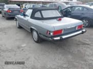 ✅ 1987 Mercedes-Benz 560 SL • VIN: WDBBA48DXHA059811 • Lot: 43363334. Wystawiony na IAAI z przebiegiem 93 042 mil. Bezpłatny archiwum sprzedaży aukcyjnych z USA i szczegółowy raport historii pojazdu na DreamBid. Zdjęcie 6.