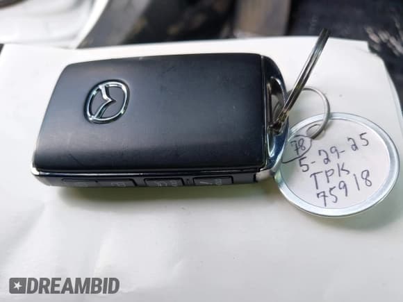 ✅ 2025 Mazda CX-50 S Premium • VIN: 7MMVABDM1SN331834 • Lot: 42412444. Listed on IAAI with 1,975 mi. Free auction sales archive from the USA and detailed vehicle history report at DreamBid. Image 11.