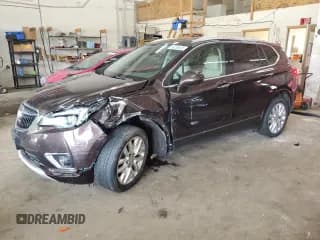✅ 2020 Buick Envision Premium • VIN: LRBFX3SX2LD169739 • Лот: 69258505. Опубликован ранее на Copart с пробегом 87 208 миль. Бесплатный доступ к архиву аукционных продаж из США и подробный отчёт об истории автомобиля на DreamBid. Изображение 1.