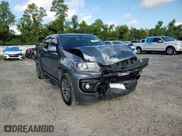 ✅ 2022 Chevrolet Colorado 2WD LT • VIN: 1GCGSCEA2N1296765 • Лот: 81406275. Опубликован ранее на Copart с пробегом 78 601 миль. Бесплатный доступ к архиву аукционных продаж из США и подробный отчёт об истории автомобиля на DreamBid. Изображение 13.