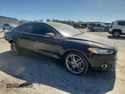 ✅ 2016 Ford Fusion Titanium • VIN: 3FA6P0D9XGR352548 • Lot: 70721425. Listed on Copart with 83,327 mi. Free auction sales archive from the USA and detailed vehicle history report at DreamBid. Image 4.