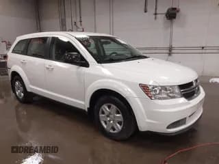 ✅ 2012 Dodge Journey American Value • VIN: 3C4PDCAB5CT203770 • Lot: 43561631. Listed on IAAI with 69,936 mi. Free auction sales archive from the USA and detailed vehicle history report at DreamBid. Image 1.