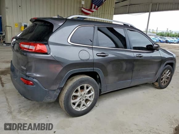 ✅ 2016 Jeep Cherokee Latitude • VIN: 1C4PJMCS6GW162674 • Lot: 96476235. Listed on Copart with 140,156 mi. Free auction sales archive from the USA and detailed vehicle history report at DreamBid. Image 3.
