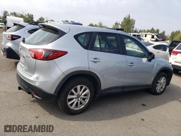 ✅ 2016 Mazda CX-5 Sport • VIN: JM3KE4BY2G0618930 • Lot: 54608855. Listed on Copart with 126,453 mi. Free auction sales archive from the USA and detailed vehicle history report at DreamBid. Image 3.