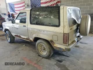 ✅ 1990 Ford Bronco • VIN: 1FMCU14T9LUA62663 • Лот: 85040114. Опубликован ранее на Copart с пробегом 9 963 миль. Бесплатный доступ к архиву аукционных продаж из США и подробный отчёт об истории автомобиля на DreamBid. Изображение 2.