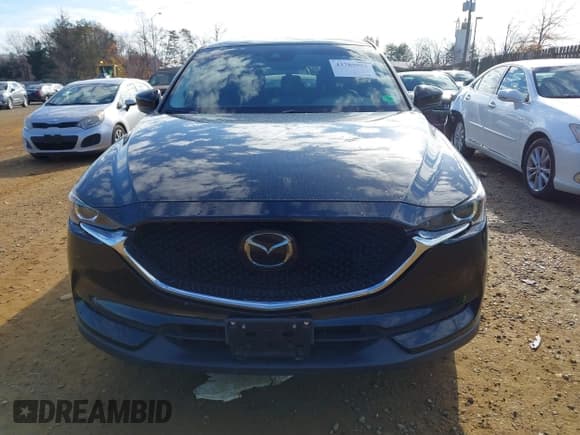 ✅ 2018 Mazda CX-5 Touring • VIN: JM3KFBCM4J0300781 • Lot: 43789902. Wystawiony na IAAI z przebiegiem 82 833 mil. Bezpłatny archiwum sprzedaży aukcyjnych z USA i szczegółowy raport historii pojazdu na DreamBid. Zdjęcie 12.