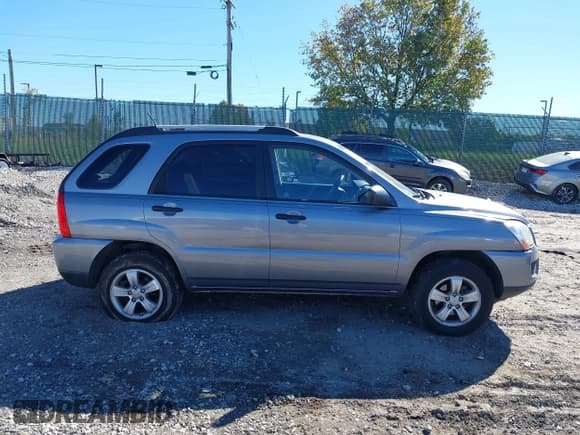 ✅ 2009 Kia Sportage LX • VIN: KNDJF724697557723 • Лот: 43463014. Опубликован ранее на IAAI с пробегом 125 664 миль. Бесплатный доступ к архиву аукционных продаж из США и подробный отчёт об истории автомобиля на DreamBid. Изображение 13.